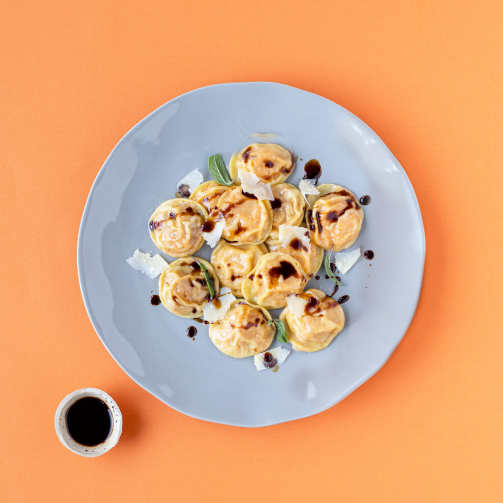 Cappelletti di zucca, Parmigiano Reggiano e Aceto Balsamico di Modena con burro e salvia