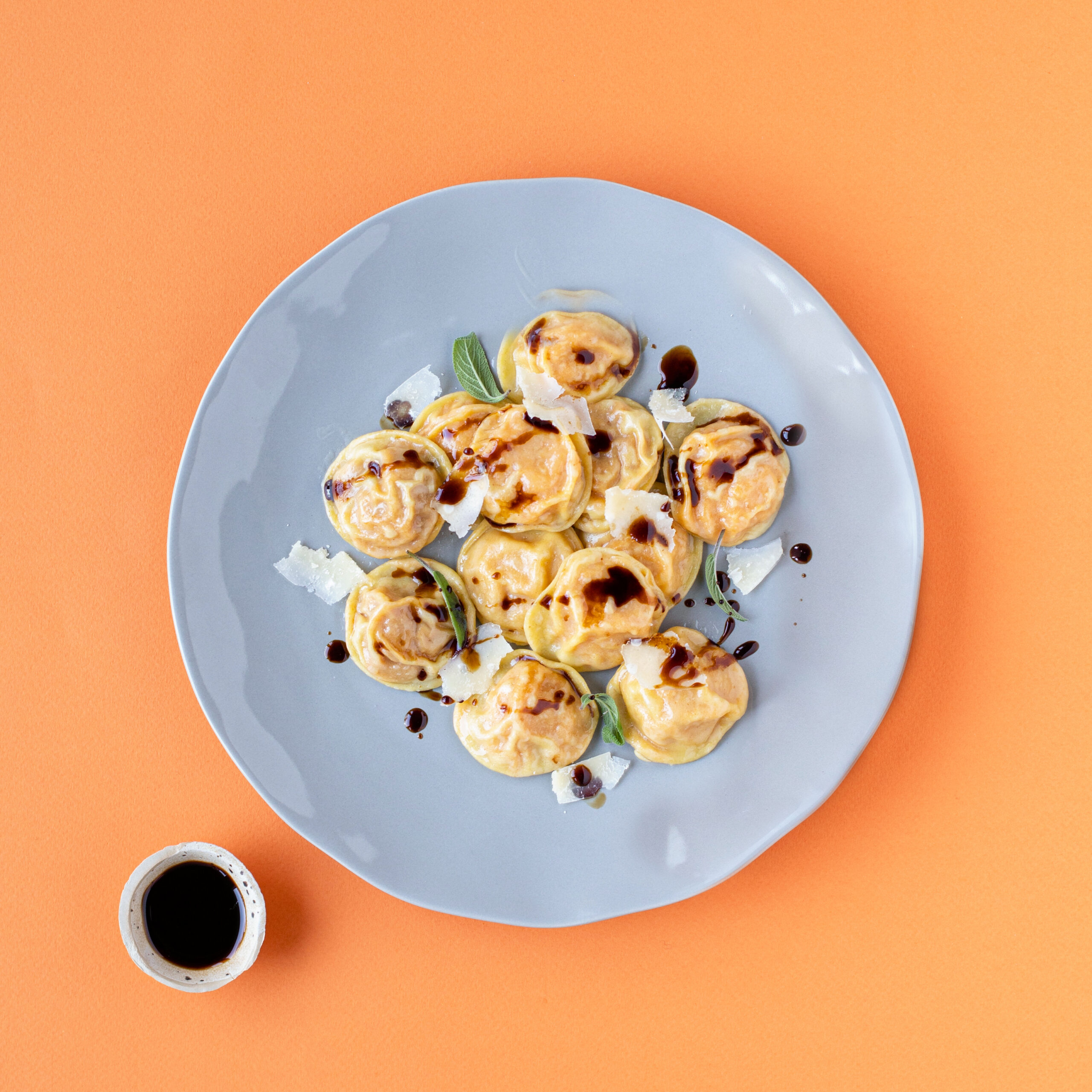Cappelletti di zucca, Parmigiano Reggiano e Aceto Balsamico di Modena con burro e salvia