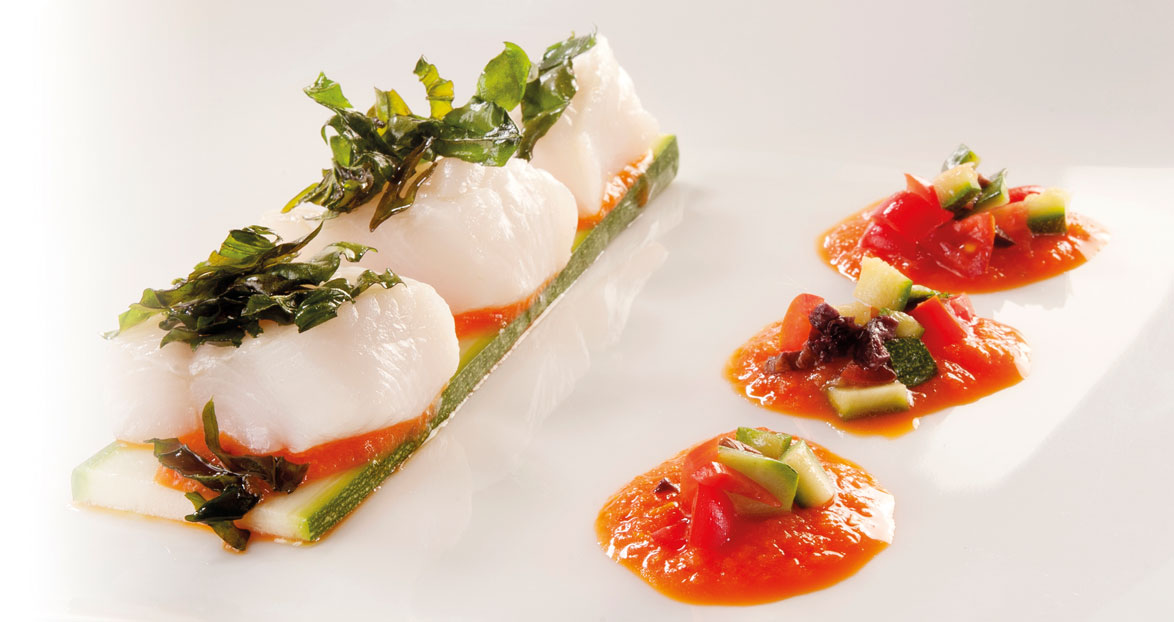 Bocconcini di dentici su crema di peperoni al profumo di Aceto Balsamico di Modena IGP