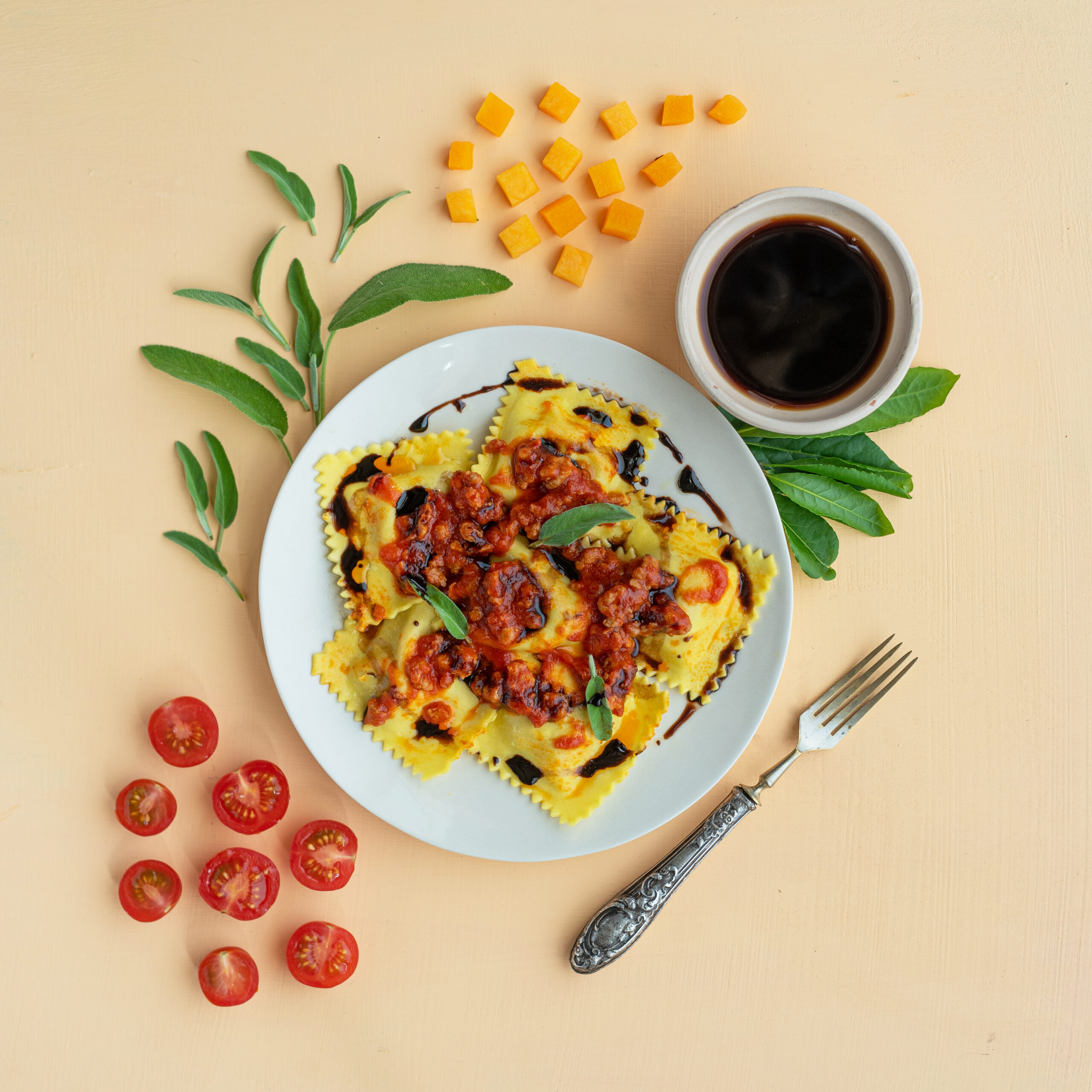 Tortelli di zucca con ragù di salsiccia all’Aceto Balsamico di Modena IGP